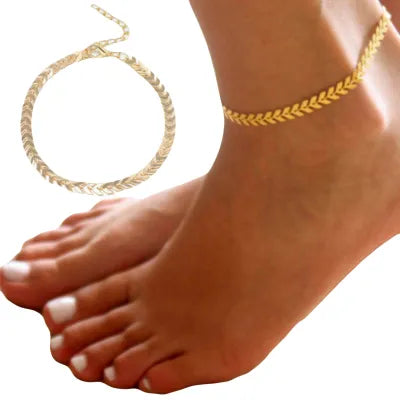 'Pair of ankle chains styled with arrow motifs"