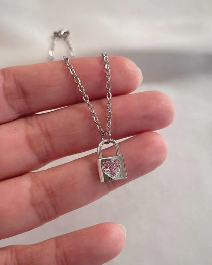 "Stunning Glittery Silver Lock Pendant - Unique Jewelry"